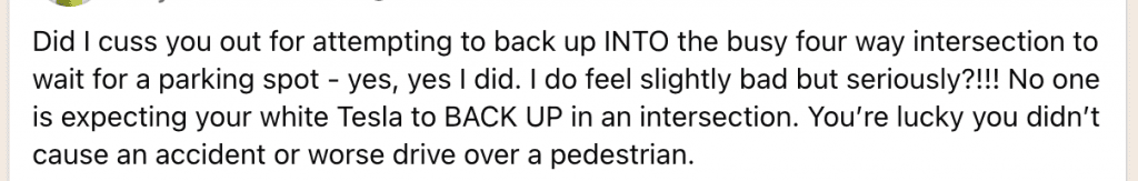 image | Vashon Maury Island Social media post about backing into a busy four-way intersection to wait for a parking spot; mentions a white Tesla.